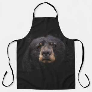 BLACK BEAR ON BROWN WOODEN TREE BRANCH APRON