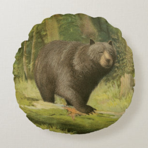 Black Bear Stepping on a Tree Trunk Round Pillow