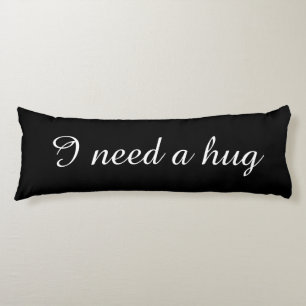 Black body pillow with custom text I need a hug