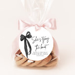 Black Bow She's Tying the Knot Bridal Shower Favour Tags<br><div class="desc">The Black Bow She's Tying the Knot Bridal Shower Favour Tags bring a touch of elegance to your bridal shower favours. Designed with a chic black bow, these tags are perfect for attaching to gift bags, boxes, or treats, creating a polished and cohesive look. A beautiful way to thank your...</div>