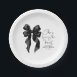 Black Bow She's Tying the Knot Bridal Shower Paper Plate<br><div class="desc">Add a pop of pretty to your bridal shower with these “She’s Tying the Knot” black bow paper plates! Adorned with a satin black ribbon design, these plates mix classy vibes with a dash of charm — perfect for everything from cocktail hour snacks to dessert table delights or a casual...</div>