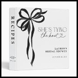 Black Bow She's Tying The Knot Shower Recipe Binder<br><div class="desc">A keepsake as timeless as the celebration itself, this bridal shower recipe binder is the perfect way to preserve cherished family recipes and new favourites alike. Designed with an air of refined elegance, it features a soft watercolor bow in a delicate black—an ode to tradition with a modern, editorial touch....</div>