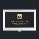 Black Brushed Gold Monogram Business Card Holder<br><div class="desc">Elevate your professional look with this stylish and practical business card case. Featuring a brushed monogram medallion with your name company and title in classic block typography, this case is a great way to keep your business cards organized and protected. The sleek black background adds a touch of sophistication, while...</div>