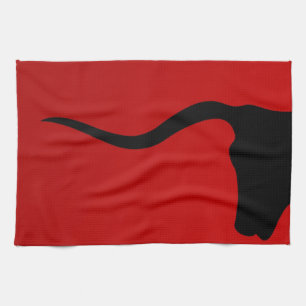 Black bull on red kitchen towel