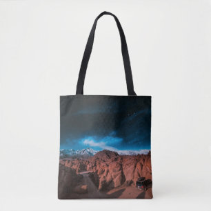 BLACK CAR NEAR ROCK FORMATIONS TOTE BAG