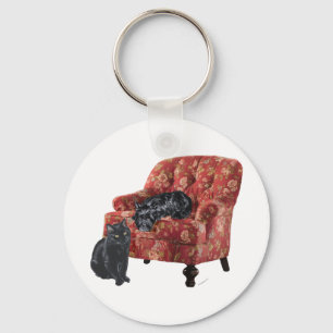 Black Cat and Scottish Terrier in a Red Chair Keychain