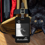 Black Cat Carrier Luggage Tag - Add your pet photo<br><div class="desc">If your black cat needs to travel in style in her very own cat carrier, attach your favourite photo and her details on the reverse and off on your travels you go. Has grey cat paw prints and a playful font. This is a photo of my black cat who I...</div>