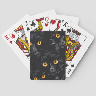 Black cat eyes playing cards
