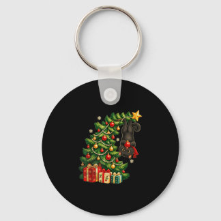 Black cat hanging from christmas tree festive pet keychain