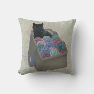 Black cat in yarn bag throw pillow