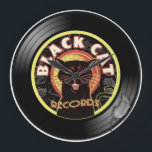 Black Cat LP Art Deco Large Clock<br><div class="desc">Are you the coolest cat around? We think so! ..and created the ultimate statement in mood and music. Sleek and smart, our combination of mysterious cat and smooth music label will have all your friends wondering where you got it.. grab yourself up some coolness with this Black Cat Records design...</div>