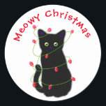 Black cat | Meowy Christmas |  twinkle lights     Classic Round Sticker<br><div class="desc">Meowy Christmas! - cute black cat with Christmas red and green twinkle lights - customizable! And design transferable!</div>