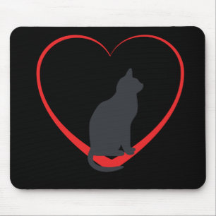 Black cat on red open heart, black background mouse pad