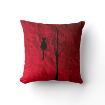 black cat on tree throw pillow