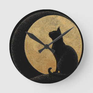Black Cat Silhouette Against a Golden Moon Round Clock