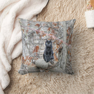 Black Cat Sitting Outdoors Throw Pillow