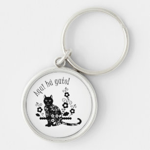 Black cat with flowers and Portuguese expression Keychain