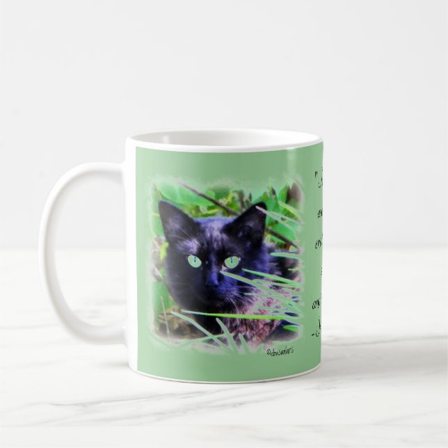 Black cat with striking green eyes coffee mug (Left)
