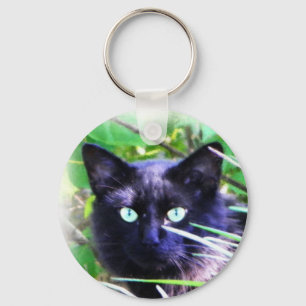 Black cat with striking green eyes keychain