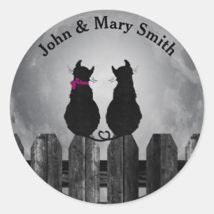 black cats on fence in moonlight classic round sticker