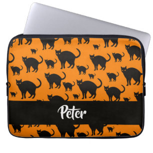 Black cats on orange laptop sleeve