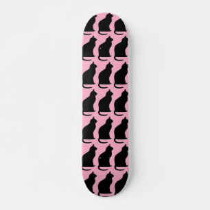Black cats on pink skateboard