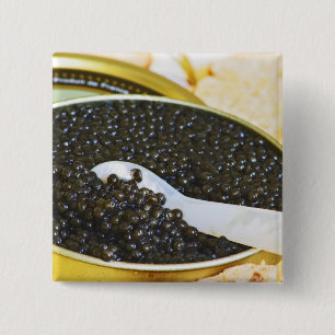 Black caviar and a spoon of mother-of-pearl to 2 inch square button