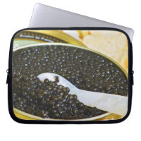 Black caviar and a spoon of mother-of-pearl to