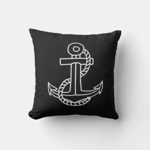Black chalkboard nautical pillow and white anchor.