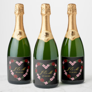 Black champagne label with a pink and red heart