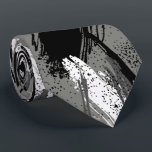 Black Charcoal Gray White Camouflage Neck Tie<br><div class="desc">Men's tie features a modern camouflage pattern in black,  charcoal,  gray and white. MORE designs in store. Cool for the office,  a night on the town,  a wedding,  for the groom or groomsmen or give as a gift to your husband,  dad,  brother or best friend. Make a statement!</div>