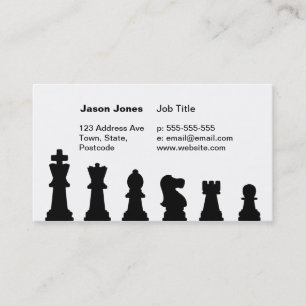 Black chess pieces on white business card