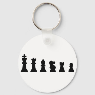 Black chess pieces on white keychain