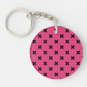 Black cross stitches on fuchsia keychain
