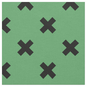 Black cross stitches on green fabric