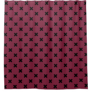 Black cross stitches on mulberry