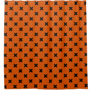 Black cross stitches on orange