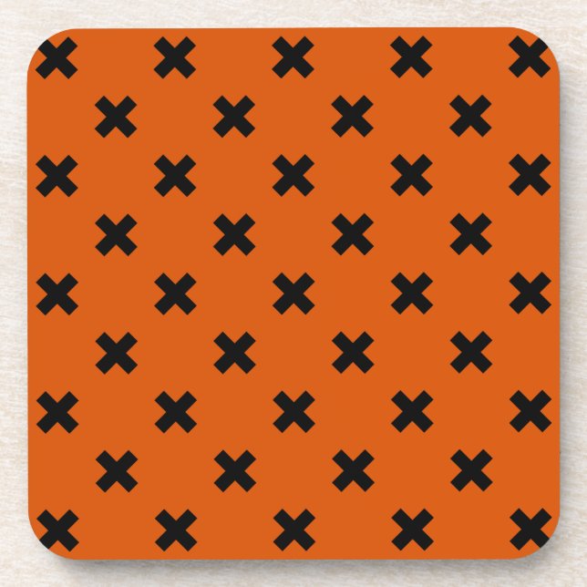 Black cross stitches on orange coaster (Front)