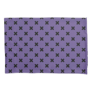 Black cross stitches on ultra violet pillowcase