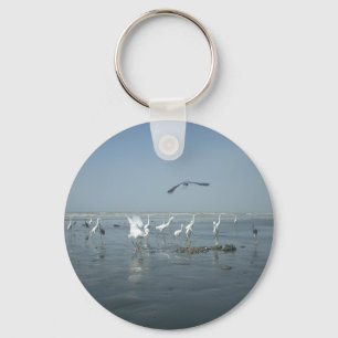 Black Crow and White Cranes: A Contrast in Nature Keychain