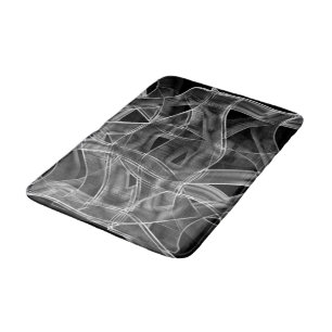 Black curved ribbons, striking the embossed lines bath mat