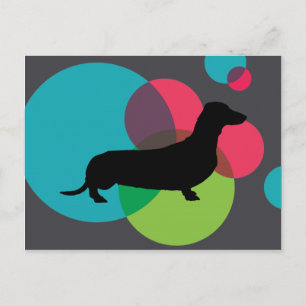Black dachshund with bright dot pattern postcard