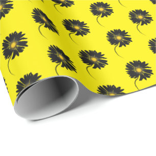 black daisy on yellow wrapping paper