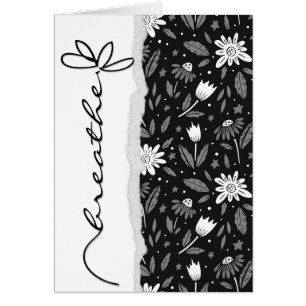 black daisy with word breathe