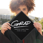 Black | Dashed Grad Graduation Cap Topper<br><div class="desc">Personalized graduation cap topper featuring "Grad" in white hand-lettering with a dashed underline with a black background or colour of your choice. Personalize the custom graduation cap topper by adding the graduate's name and graduation year.</div>