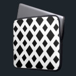 Black Diamonds on White Laptop Sleeve<br><div class="desc">A bold,  geometric pattern of large and small black diamonds on a white background. The white forms a lattice which separates the diamond shapes. 

 Digitally created 9000 x 6000 pixel image. 
 Copyright ©2013 Claire E. Skinner,  All rights reserved.</div>