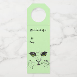 Black Drawing of Cat Face Long Whiskers Green eyes Bottle Tag