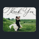 Black Elegant Handwritten Script Photo Wedding Magnet<br><div class="desc">Celebrate your love and show gratitude with our customizable photo wedding thank you magnet! This unique keepsake is perfect for reminding your loved ones of your special day while expressing your heartfelt thanks in a memorable way. It features an elegant white script. Personalize by adding your photo and details. This...</div>
