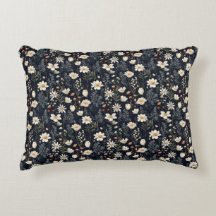 Black floral with beige and orange accent pillow