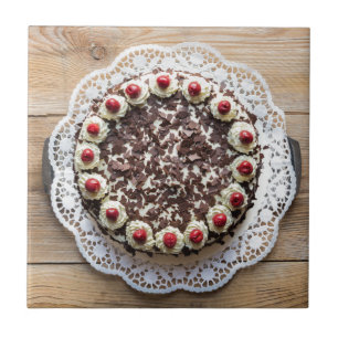 Black Forest cake on rustic wood Tile